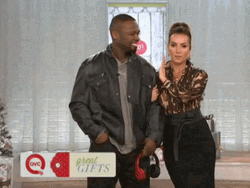 50 Cent Beside A Beautiful Lady GIF