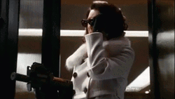 80S Lady Taking Off Sunglasses GIF