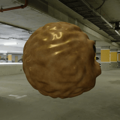 A 3D Rendering Of A Walnut Floating In A Parking Garage GIF