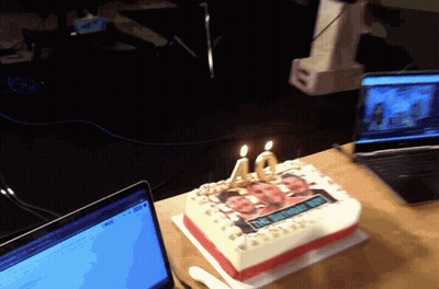 A 40Th Birthday Cake With Two Candles On It GIF