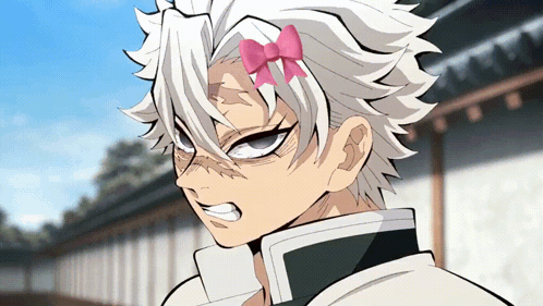 A Anime Character With A Pink Bow In His Hair GIF