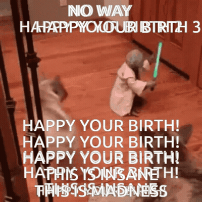 A Baby Dressed As Yoda Is Holding A Green Light Saber GIF