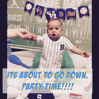 A Baby In A Baseball Uniform With The Letter S On His Chest GIF