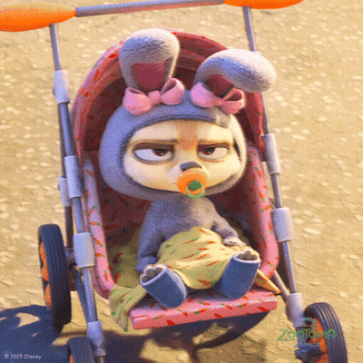 A Baby In A Bunny Costume Is Sitting In A Stroller With A Pacifier In Her Mouth GIF
