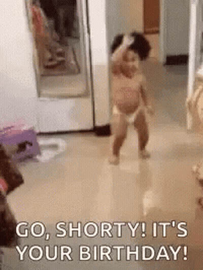A Baby In A Diaper Is Dancing In A Room With The Words `` Go Shorty ! It 'S Your Birthday '' . GIF