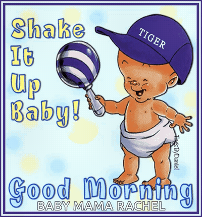 A Baby In A Diaper Wearing A Tiger Hat Holds A Rattle GIF