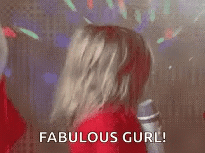 A Baby In A Santa Suit Is Holding A Microphone And Saying `` Fabulous Girl ! '' GIF