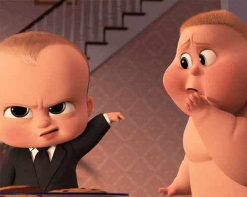 A Baby In A Suit And Tie Points At Another Baby GIF
