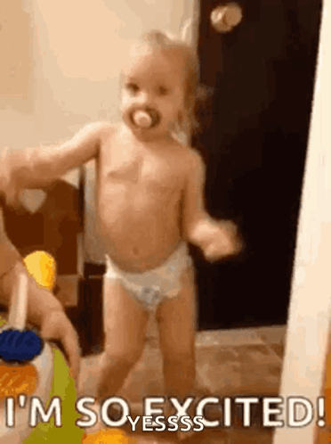 A Baby In Diapers Is Dancing With A Pacifier In Its Mouth . GIF