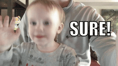 A Baby Is Being Held By A Man Who Is Wearing A Shirt That Says " Sure " GIF