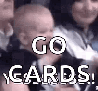 A Baby Is Being Held By A Woman And The Words `` Go Cards '' Are Written Above It . GIF