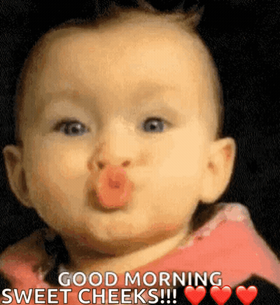 A Baby Is Blowing A Kiss And Says Good Morning Sweet Cheeks GIF