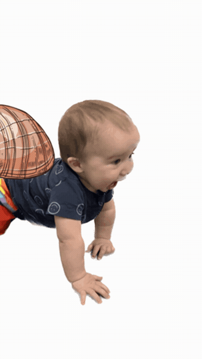 A Baby Is Crawling With A Drawing Of A Shell On His Back GIF