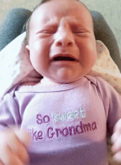 A Baby Is Crying While Wearing A Shirt That Says So Sweet Like Grandma GIF