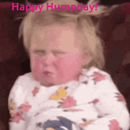 A Baby Is Crying With The Words Happy Humpday Written Above Him GIF