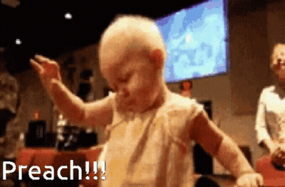 A Baby Is Dancing In Front Of A Large Screen That Says Preach GIF