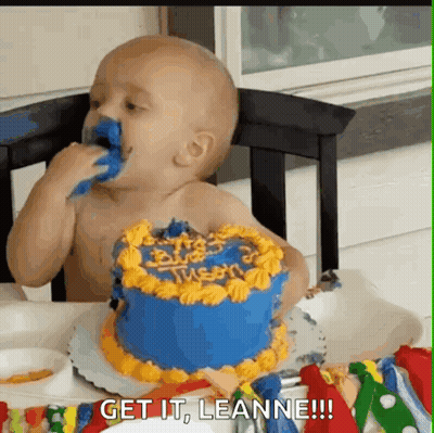 A Baby Is Eating A Birthday Cake With The Words Get It Leanne Written On The Bottom GIF