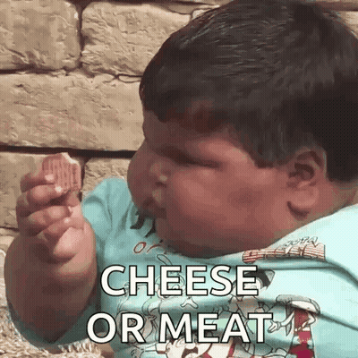 A Baby Is Eating A Piece Of Cheese With The Words Cheese Or Meat Written On It . GIF