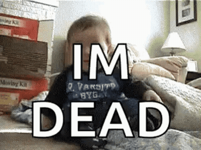 A Baby Is Laying On A Bed With The Words Im Dead Written Above Him GIF