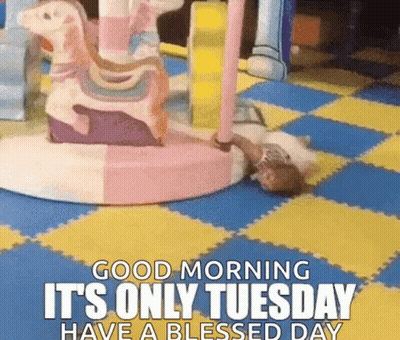 A Baby Is Laying On A Carousel With The Words Good Morning It 'S Only Tuesday Have A Blessed Day GIF