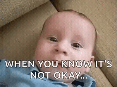 A Baby Is Laying On A Couch With The Words `` When You Know It 'S Not Okay ... '' Written On It . GIF