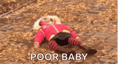 A Baby Is Laying On The Ground With The Words `` Poor Baby '' Written Above Him . GIF