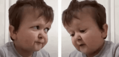 A Baby Is Making A Funny Face And Making A Funny Face . GIF