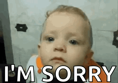 A Baby Is Making A Funny Face And Saying I 'M Sorry . GIF