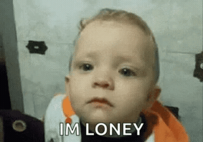 A Baby Is Making A Funny Face And Saying `` Im Lonely '' . GIF