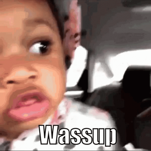 A Baby Is Making A Funny Face And The Word Wassup Is Visible GIF
