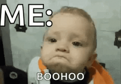 A Baby Is Making A Funny Face With The Words `` Me : Boohoo '' Written Above It . GIF