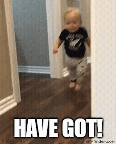 A Baby Is Running In A Hallway With The Words `` Have Got '' Written On The Floor . GIF