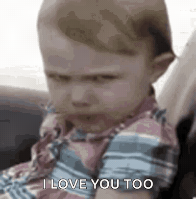 A Baby Is Sitting In A Car Seat And Saying I Love You Too . GIF