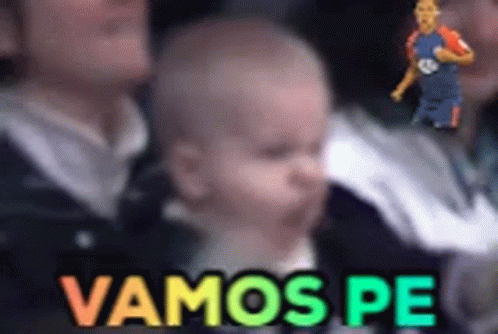 A Baby Is Sitting In A Crowd With The Words Vamos Pe Written On It GIF