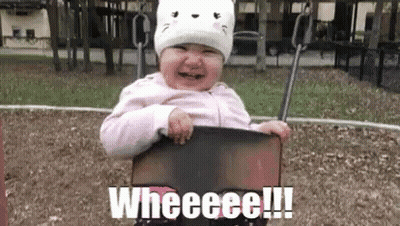 A Baby Is Sitting On A Swing At A Playground And Crying . GIF
