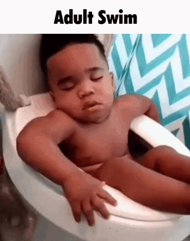 A Baby Is Sleeping In A Bathtub With The Words `` Adult Swim '' Written Above Him . GIF