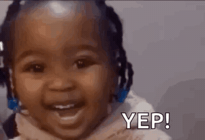 A Baby Is Smiling With The Words Yep Written Next To Her . GIF