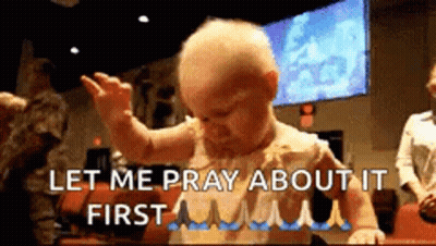 A Baby Is Standing In Front Of A Group Of People And Says Let Me Pray About It First . GIF