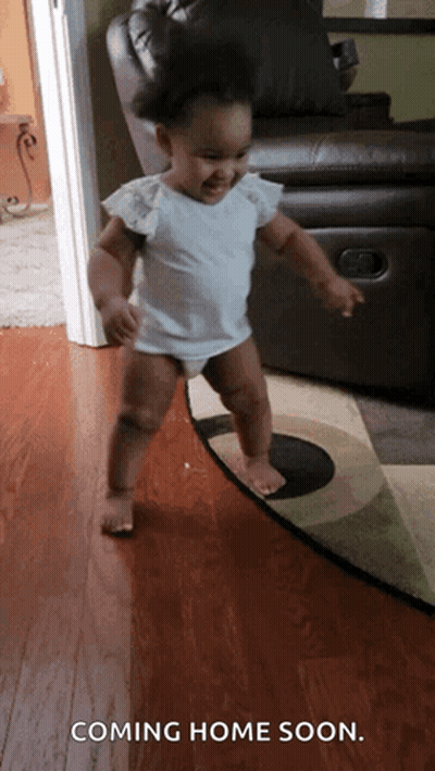 A Baby Is Walking On A Rug With The Words Coming Home Soon GIF