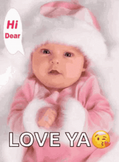 A Baby Is Wearing A Pink Outfit And A White Hat And Says Love Ya . GIF