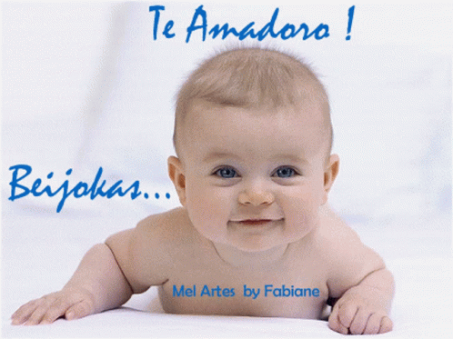A Baby Laying On A Bed With The Words Te Amadora Beijokas GIF