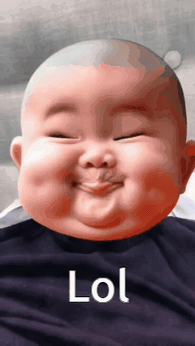 A Baby Making A Funny Face With The Word Lol On The Bottom Right GIF