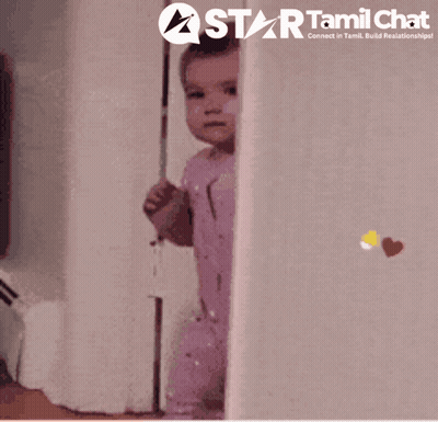 A Baby Peeking Out From Behind A Wall With A Star Tamil Chat Logo Behind It GIF