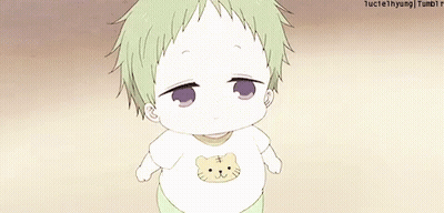 A Baby Wearing A White Shirt With A Cat On It . GIF