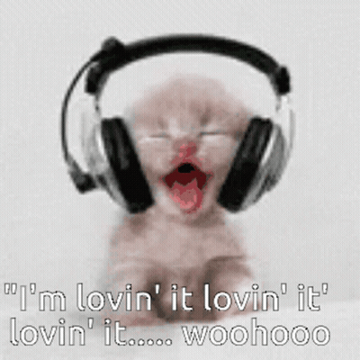 A Baby Wearing Headphones Says I 'M Lovin ' It Lovin ' It Lovin ' It GIF