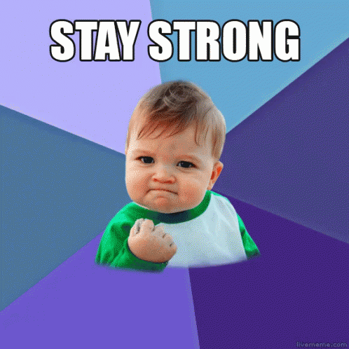 A Baby With A Fist In The Air And The Words Stay Strong GIF