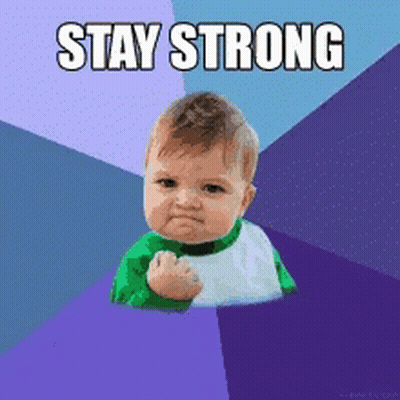 A Baby With A Fist Up And The Words Stay Strong GIF