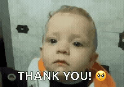 A Baby With A Sad Face Is Saying Thank You . GIF