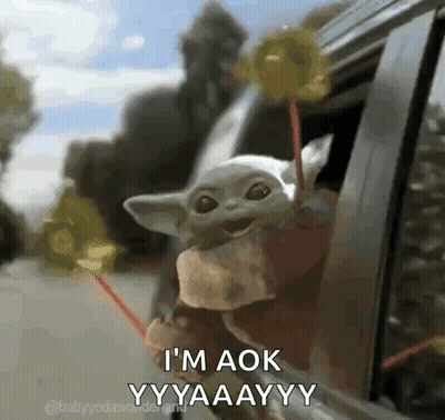 A Baby Yoda Is Sticking Its Head Out Of A Car Window Holding Lollipops . GIF