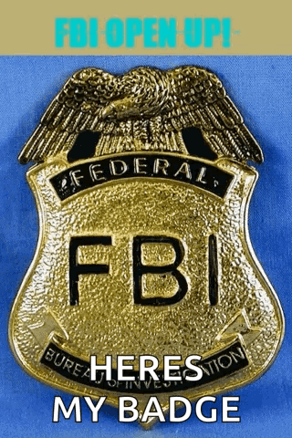 A Badge For The Federal Bureau Of Investigation Is Shown GIF